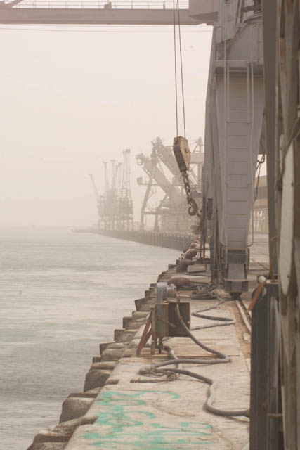 The cranes at the new port of Um Qasr sit ready to unload humanitarian assistance after being liberated March 22, 2003.  The site was surveyed by members of the United States Agency for International Aid and the 4th Civil Affairs Group March 26. (Image/caption credit: DoD CENTCOM)