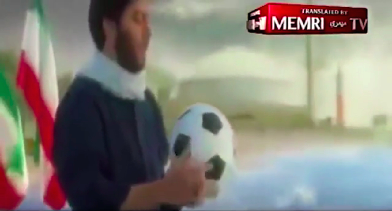 Iranian propaganda video: A man holding a soccer ball on the beach after depiction of the Iran Air Flight 655 accidental shootdown and the depiction of the sinking of an entire US Navy Fleet, including the USS Vincennes. A nuclear reactor along the beach can be seen in the background.
