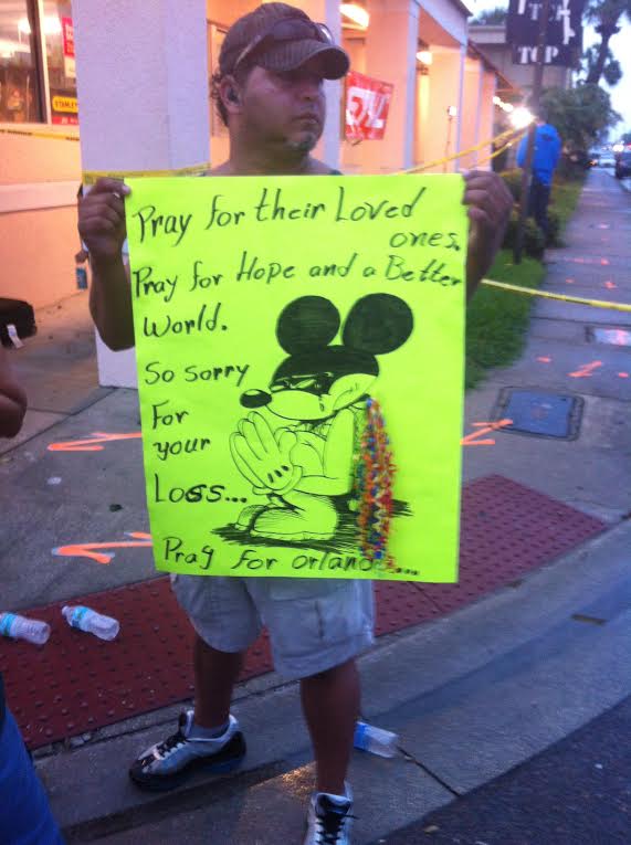 ORLANDO, FL - JUNE 12, 2016 A sign reads "Pray for Orlando" and depicts a crying Disney Mickey Mouse.  Image credit: 1776 Channel